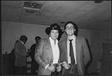 1280 CHAM hosted two sold out performances at Hamilton Place with superstars Mickey Gilley and Charley McClain. After the shows Mickey posed for cameras and is seen here with 1280 CHAM afternoon drive personality Brian Wood [between 1980-1985].