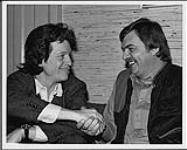 John Hammond shaking hands with Mike Gaitt (National Sales Manager, RCA) - Toronto, Ontario [between 1980-1985].
