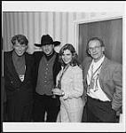 Portrait of BMG's Ken Bain, Julian Austin, BMG GM Lisa Zbitnew and Austin's manager Fred Horsley [between 1997-2000].