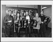 BMG Canada President and General Manager Paul Alofs presents the band Ace of Base with a Diamond Award for their song The Sign. BMG Head Office [between 1993-1996].