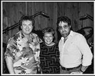 Portrait of Larrie Londin, Carroll Baker, and Jack Scott during The Best of Love session. Larrie Londin was probably the most sought after session drummer in Nashville. Londin credits Jack Scott's early hits as being his early musical  influence. Londin has played on thousands of hit singles from Carroll Baker and Jack Scott to Elvis Presley. [ca 1983]
