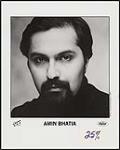 Close-up press portrait of Amin Bhatia. Cinema / Capitol Records 1987