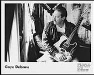Portrait of Gaye Delorme and a guitar [ca 1993].