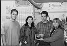 From left to right: Manager of Sam the Record Man, Vancouver- Neil Gremel. Recording artist- Damhnait Doyle. EMI Sales Rep.- Mark Vance. EMI Customer Service Rep.- Heidi Hoff [ca 1996].