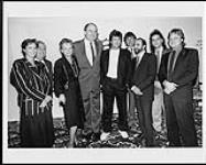 David Foster and Stan Kulin with a group of unidentified people 1988