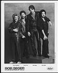 Publicity portrait of Bob Seger & the Silver Bullet Band - (left to right) Chris Campbell, Craig Frost, Bob Seger, Alto Reed 1986