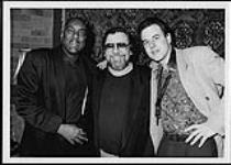 Left to right - Joe Sealy, Doug Riley, Phil Dwyer [entre 1990-2000].