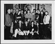 Sloan receiving a Gold album award and posing with staff from MCA Music Entertainment [ca 1996].