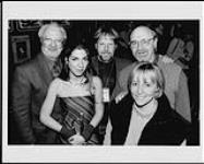 Ivana Santilli posing with music representatives - (left to right) Bill Ott (President of Oasis Entertainment), Ivana Santilli, Allan Gregg (Chairman of The Song Corporation), Victor Page (CEO of Page Music), Colleen Broadhurst (VP of Marketing and Promotion, Page Music) [entre 1991-1995].