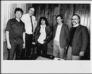 Left to right - Bob Roper (WEA Canada A&R Manager), Stan Kulin (WEA Canada President), Eddie Schwartz, Frank Davies (ATV), Ross Reynolds (WEA Canada Exec. VP) [entre 1983-1990].