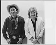 Ricky Skaggs and Ian Tyson after a performance, during a tour of Western Canada [ca 1984].
