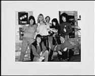 Thor (Jon Mikl) posing with his album and the staff at Attic Records - (left to right, top row) Keith Zazzi, Thor, Al Mair (Attic Press), Rusty Hamilton, Steve Price, (bottom row) Ralph Alfonso (Attic National Promotion), Lindsay Gillespie (Attic Marketing) [ca 1985].