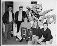 Radio station "The Fox" in Vancouver receiving Platinum album awards for the band Tool's "Aenima" album - (left to right) Terry Hyska (BMG Branch Manager, Vancouver), Ray Ramsay (BMG Promotions), Rob Robson (Music Director, The Fox), Lyle Chausse (radio host, The Fox), Rob Gray (radio host, The Fox) n.d.