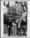 Group standing outside the 104 CHUM-FM building, Toronto, on April 27, 1999 - (left to right) Bobby Gale (of Plug band), Barry Stewart (APD/MD of CHUM-FM), CJ Huyer (of 3deep band), Rob Farina (PD of CHUM-FM) 27 avril 1999