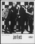 Press portrait of The Jitters in front of a checkered wall 1987.