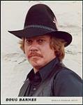 Publicity portrait of Doug Barnes wearing a black cowboy hat and black clothing [between 1990-2000].