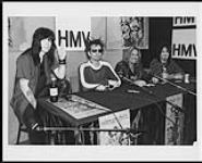 Mötley Crüe dropped by HMV Yonge Street to sign copies of their new "Greatest Hits" album. Shown from left to right are: Mick Mars, Tommy Lee, Vince Neil and Nikki Sixx 1998