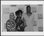 Marvalicious (left), Carla Marshal (center) and Denis Jones (right) posing with their Juno award [between 1990-2000]