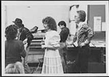 Anita Perras et Tommy Hunter lors d'une répétition [ca 1984].