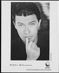 Robbie Robertson. (Geffen Records publicity photo) [between 1987-1991].