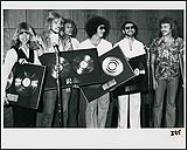 One week in advance of their new album, A&M recording stars STYX were presented with Gold and Platinum awards for "Pieces Of Eight", celebrating over 150,000 advance orders 1 septembre 1978