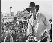 Polygram recording artist Frank Mills visited CKXL at the Calgary Stampede and helped distribute over 1,000 Orange Crush scented CKXL frisbees during his National Promo tour [between 1978-1980].