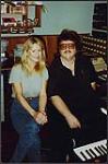 Lisa Erskine and Rich Dodson taking a break during the recording of Lisa's Christmas song "Home For The Holidays" at Marigold Studios [between 1995-1996].