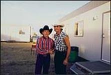 Danny Hooper, four time host and MC of the Camrose Big Valley Jamboree, joins Wade Hayes backstage at the August long weekend event 15 août 1997