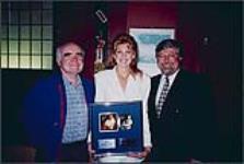 Bill Johnson, Faith Hill holding an award and Garry Newman [ca 1993].