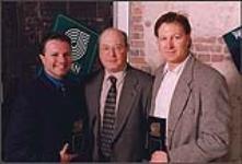 SOCAN presents No. 1 plaques to songwriters Gilles Godard and Tim Nichols in recognition of their song, "I Want A Man". The song recorded by Lace reached the top of CMT's Top 20 Video Countdown March 6, 2000