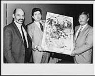 Peter Erdman, Ken Graydon and Kroum Pindoff hold an unidentified drawing [between 1975-1980].