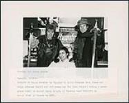 CHUM FM's, Wayne Webster, is flanked by Attic Records' Ralph Alfonso and A&M's Pat Ryan, during a promo launch for the Toronto band, Warriors, on Attic Records [ca. 1983].