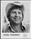 Publicity portrait of Russell Thornberry wearing a cowboy hat [between 1976-1978].