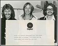 Nick Gilder with Billy Gorrie and John Keel of CKRC, Winnipeg [between 1976-1979].