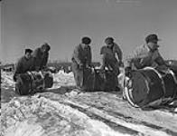 Drums of mustard gas awaiting disposal 30 Jan. 1946.