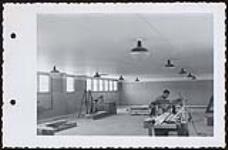 [Bishop Horden Memorial School, recreation room in dormitory, Moose Factory Island, Ontario, May 24, 1956] May 24, 1956