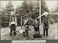 [Four Ojibway police chiefs, unknown location] [ca. 1920-1930].