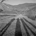 The shadows of Rosemary Gilliat, Anna Brown, Audrey James and Helen Salkeld, possibly at Similkameen Valley, British Columbia 27 août 1954.