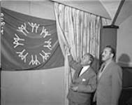 Dupuy presents Expo flag to the Montreal Press Club June 11, 1965
