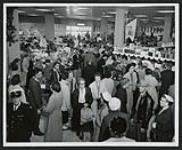 [A crowded store, Regina, Saskatchewan, 1957] 1957.