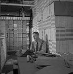 Checking election supplies for each poll in Canada after assembly at the Chief Electoral Office mai 1952