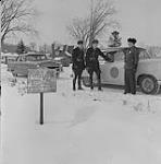 La GRC et la police d'État américaine patrouillant de leur côté respectif de la frontière 1957