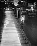 The Aluminum Ltd. hot mill converts aluminium ingots to plate and sheet June 1959