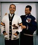 Phil Watson (L), of Boston Bruins, and Doug Harvey, of New York Rangers 29 July 1961.