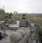 Fallex 88. Sergeant Neuman and Corporal Mackeage in Leopard tank (rear view) September 1988.