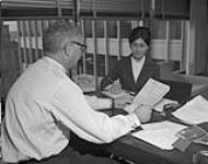 [Andrew] Kniewasser and secretary [between 1964-1967]