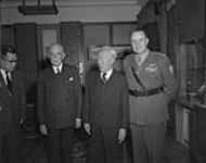 Prime Minister Louis St. Laurent; Mr. Knee and Brig. J.V. Allard in Korea March 1954.