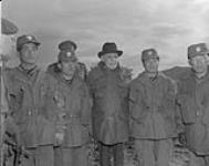 Prime Minister Louis St. Laurent visits 3rd Bn, RCR, at the rifle range in Korea. Major Jenkins in command March 1954.