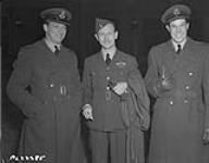 RW McNair with RA Buckham and HC Godefroy during investiture 11 November 1943.