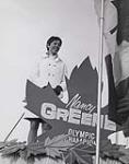 Nancy Greene, Olympic ski champion, atop parade float in Ottawa 27 February 1968